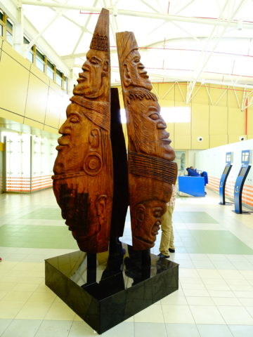 Shoulders of vision and hope Sculpture: Wood Style: Semi abstract Theme: Cultural african sculpture art by Kenyan artist based in Nairobi.